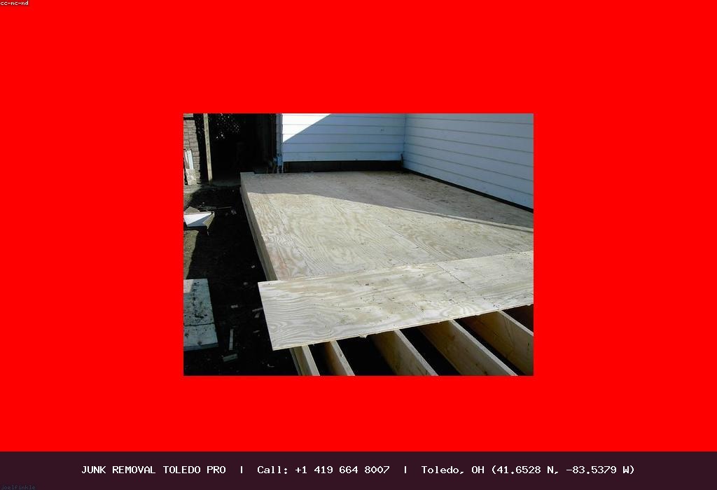 Wooden deck teardown by Junk Removal Toledo Pro crew
