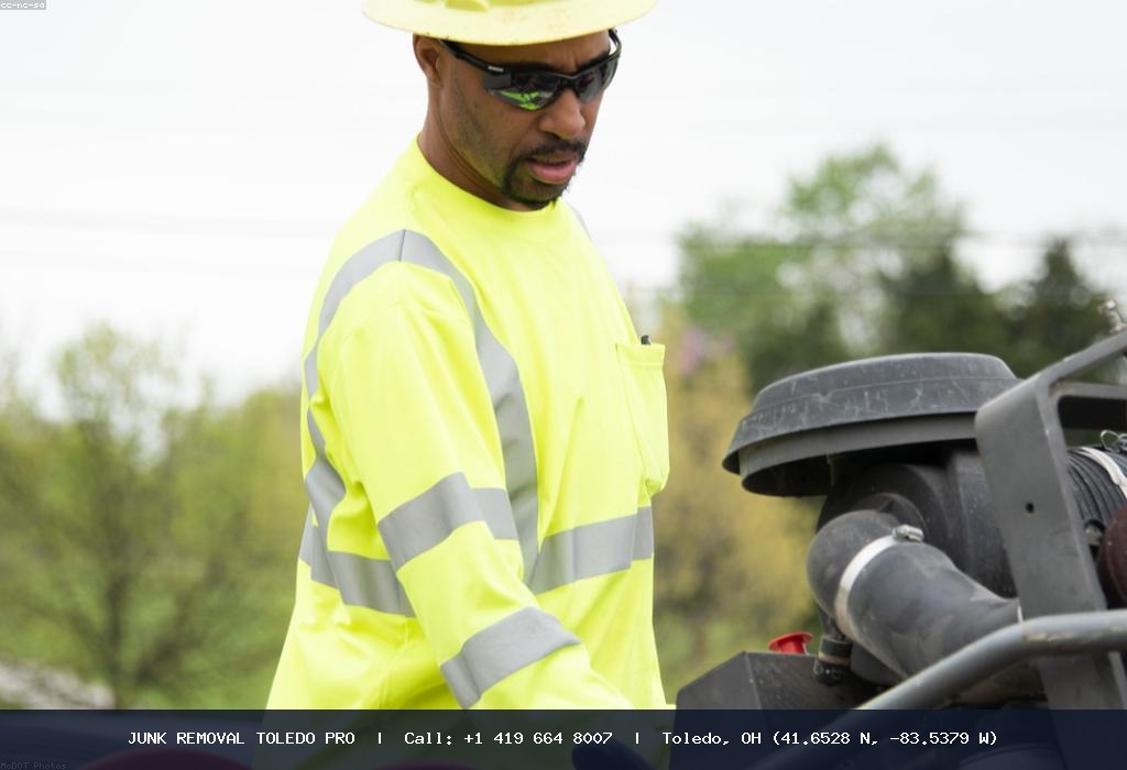 Safety hardhat gear worn by Junk Removal Toledo Pro demolition technician